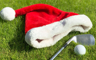 Golf club with santa hat