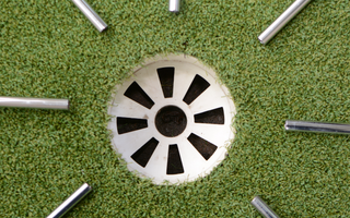 Steel Golf Shafts Lying Around Golf Hole