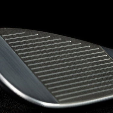TaylorMade Milled Grind 4 Black Golf Wedges showing a close up of the face