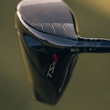 Titleist TSR2 on green background with face showing